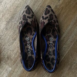 Rothy's Stylish Brown and Black Flats with Leopard Print